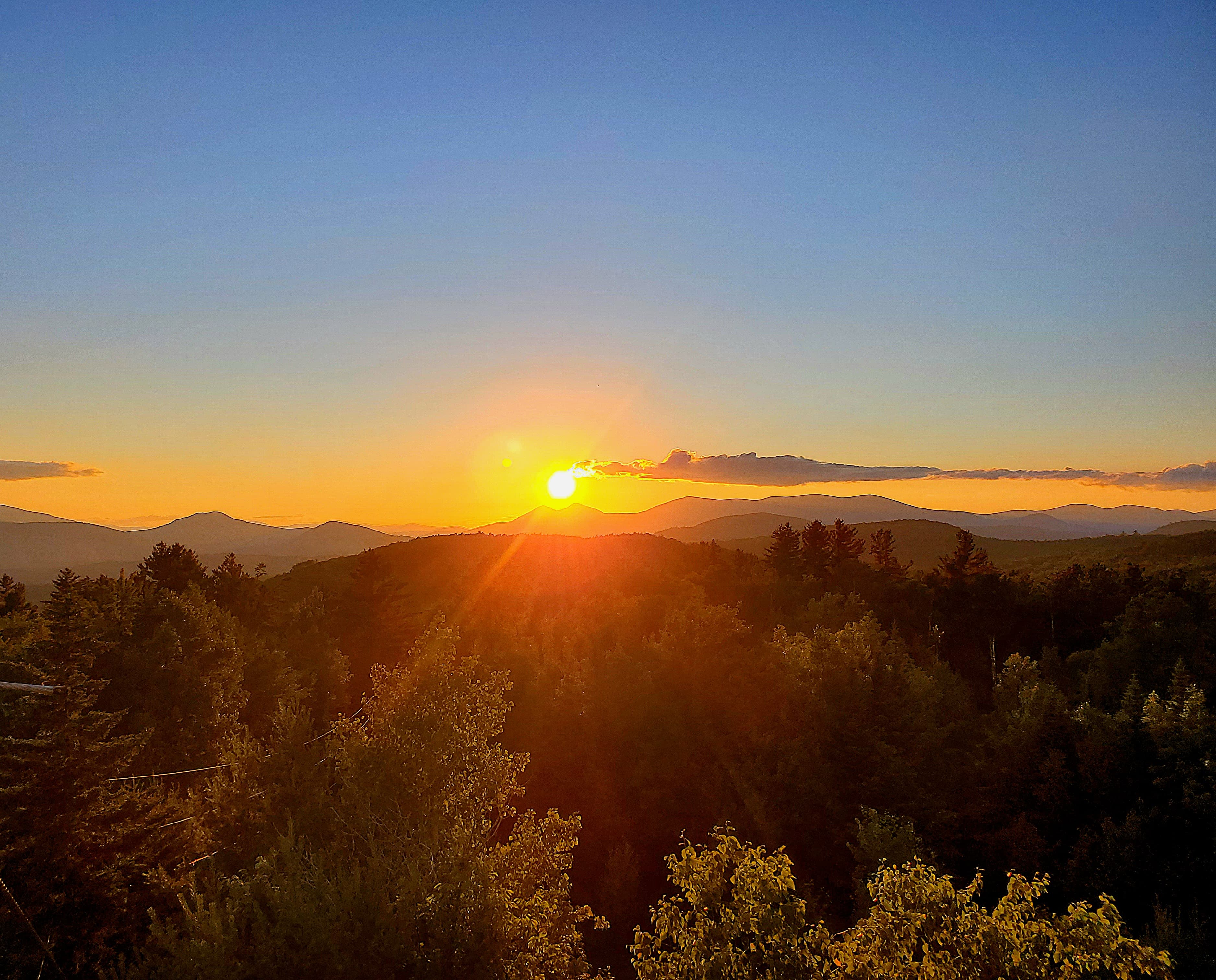 Sunset with mountains in the background